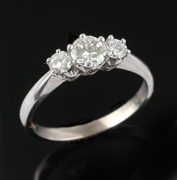 Appraisal: A diamond three stone ring The principal round brilliant cut