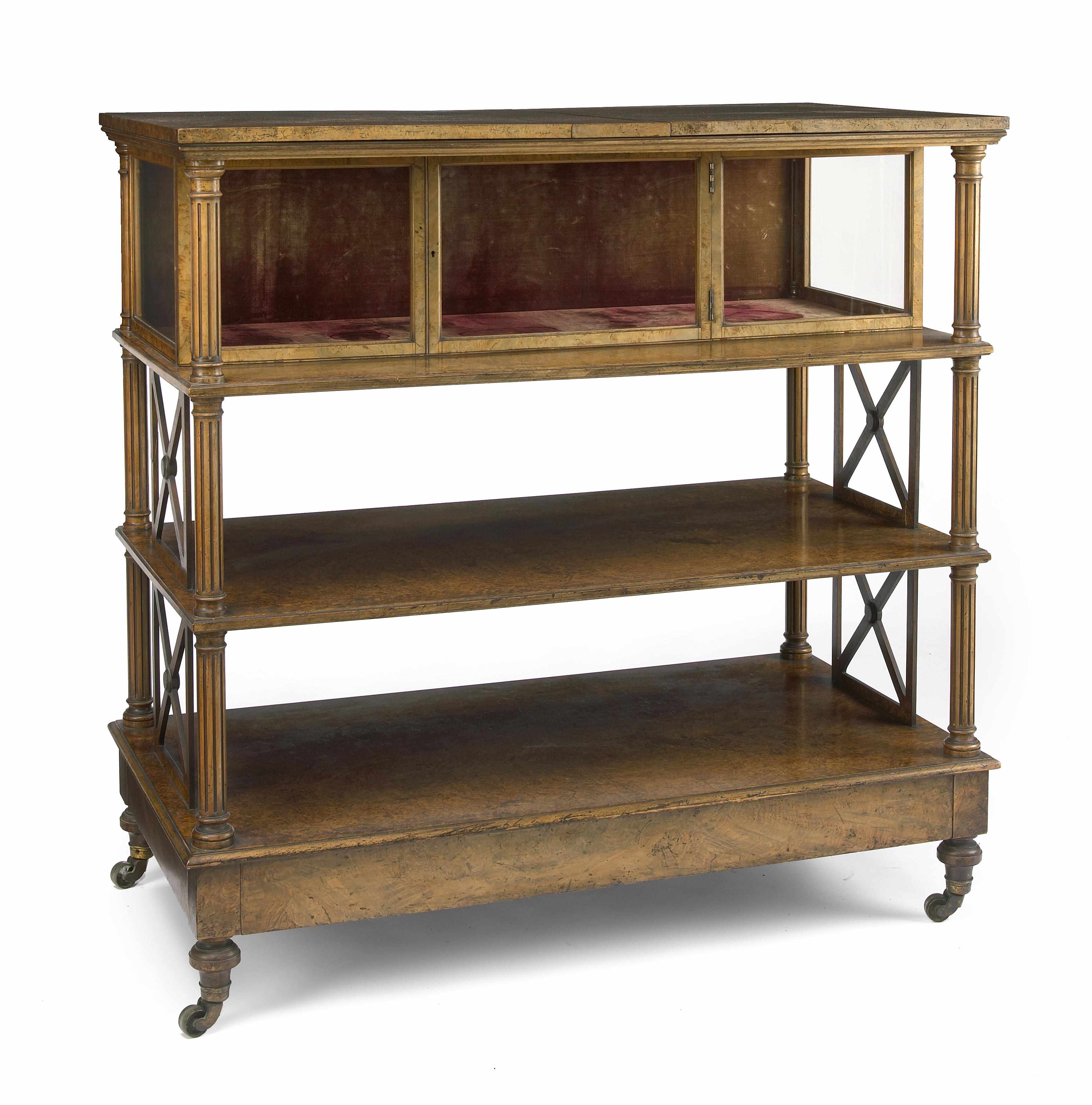 Appraisal: A Victorian figured walnut folio stand possibly by Gillows of