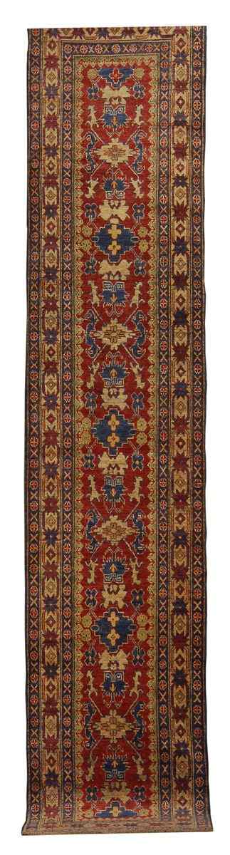 Appraisal: ORIENTAL RUG KAZAK DESIGN ' x ' '' Repeating stylized