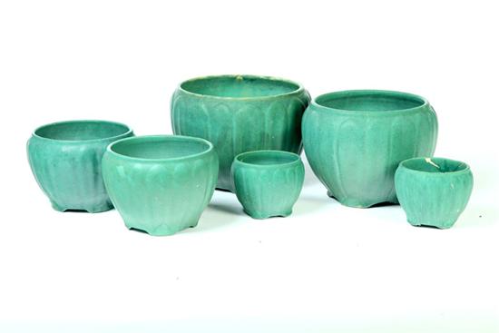 Appraisal: SIX ART POTTERY PLANTERS American th century Matte green glaze