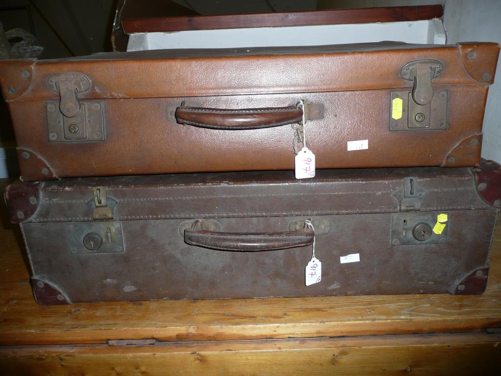 Appraisal: Two old brown suitcases - pressed cased