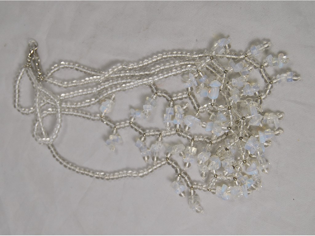 Appraisal: Three stand opaline and clear bead necklace