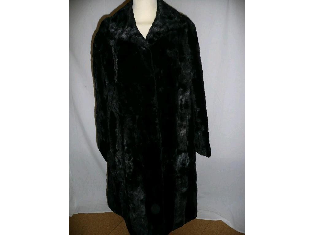 Appraisal: One black fur coat