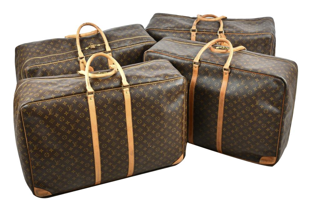 Appraisal: GROUP OF FOUR LOUIS VUITTON STYLE SOFT CASE SUITCASESCondition each