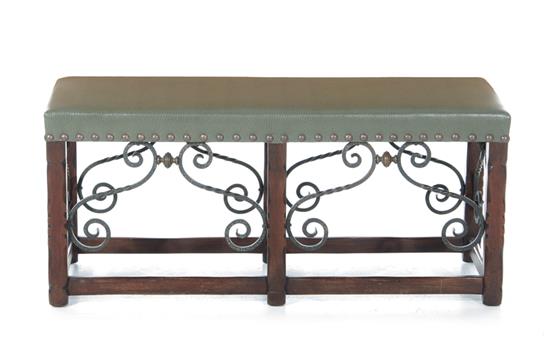 Appraisal: Spanish Colonial style walnut wrought-iron and leather bench H W