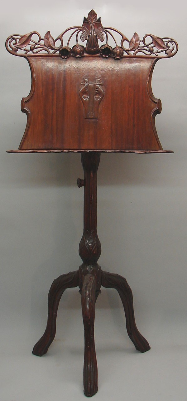 Appraisal: Mahogany floral and foliate pierced carved music stand adjustable height