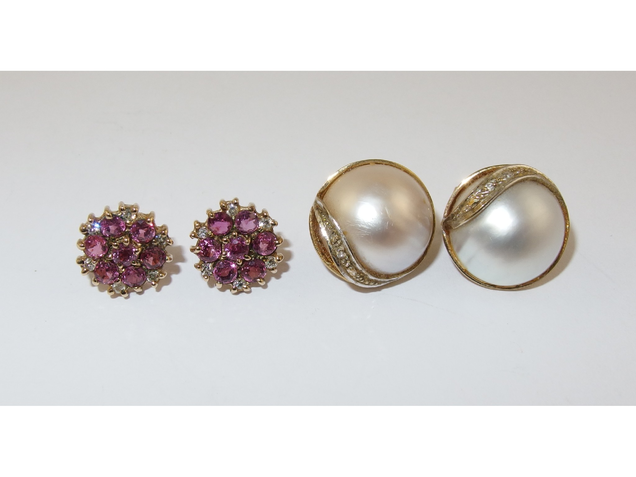 Appraisal: A pair of ct diamond and pink gem set earrings