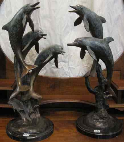 Appraisal: TWO MARINE WILDLIFE BRONZE SCULPTURES dolphin groups two and three