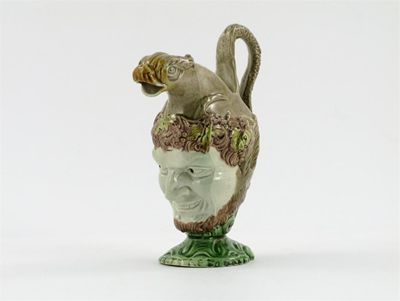 Appraisal: A Ralph Wood type Bacchus jug moulded with the face