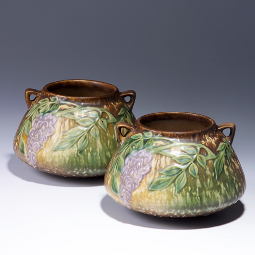 Appraisal: Pair of ROSEVILLE brown Wisteria squat vessels Line from rim