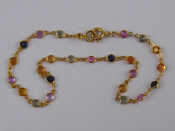 Appraisal: A yellow metal tests carat gold multi gem bracelet approx