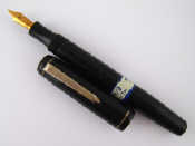 Appraisal: A black Mentmore Supreme fountain pen button fill ct gold