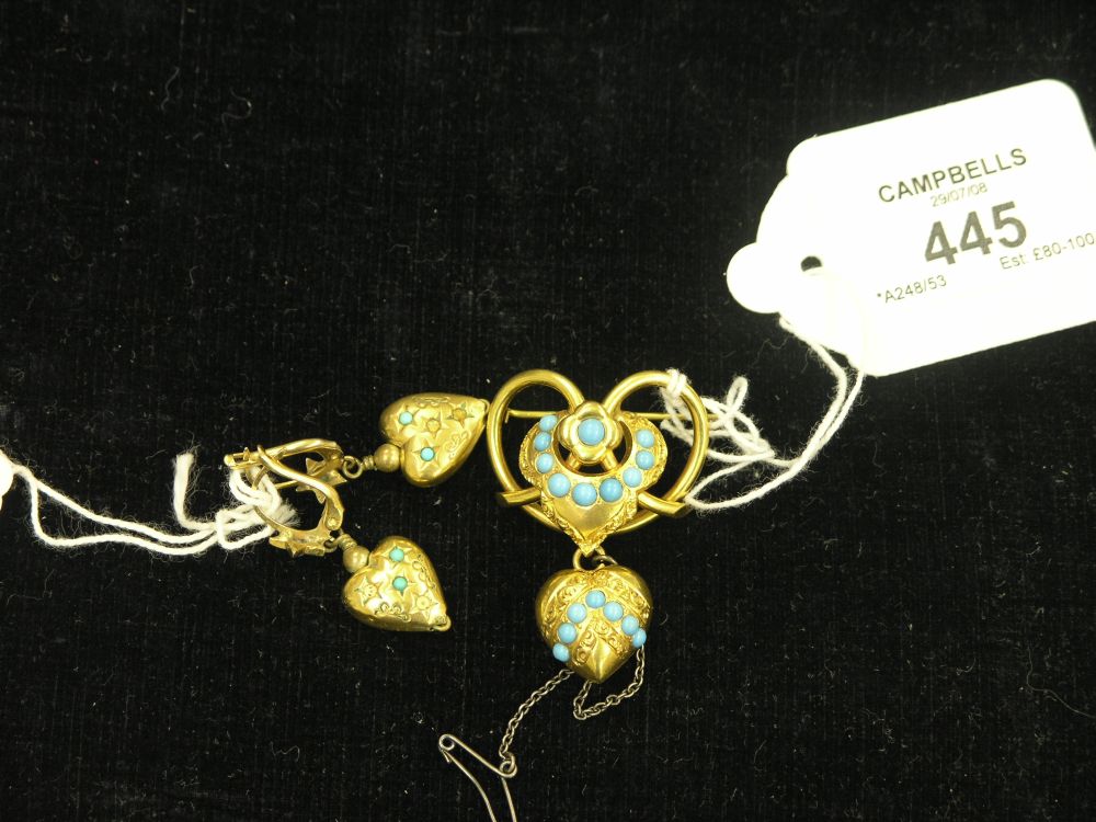 Appraisal: A gilt metal brooch with heart shaped pendant set with