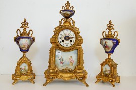 Appraisal: FRENCH GILT SPELTER AND HAND PAINTED PORCELAIN THREE PIECE CLOCK