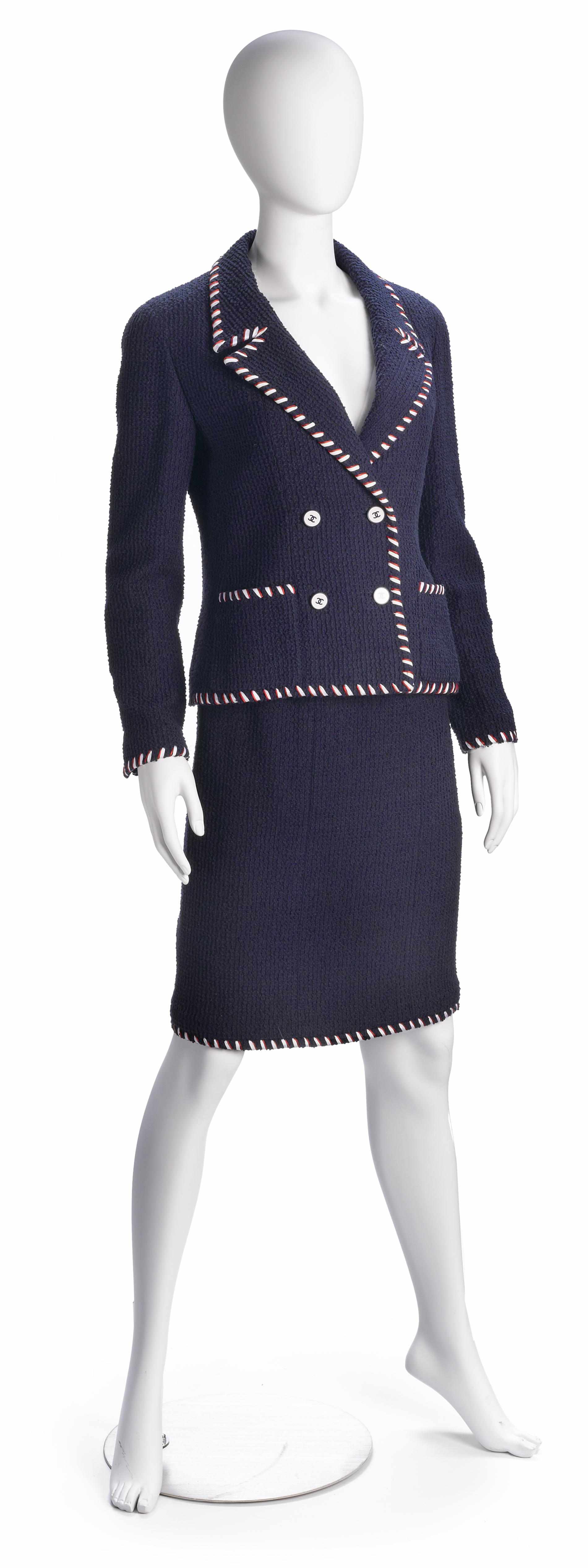 Appraisal: A Chanel navy white and red ribbon trimmed jacket and