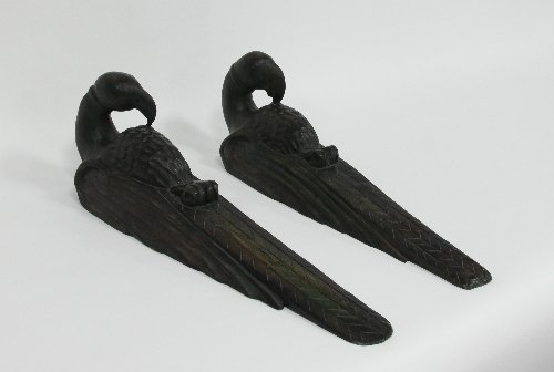 Appraisal: A pair of carved wooden parrot wall carvings cm high