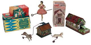 Appraisal: Group of Four Vintage Tin Toys Two Boxed Including a