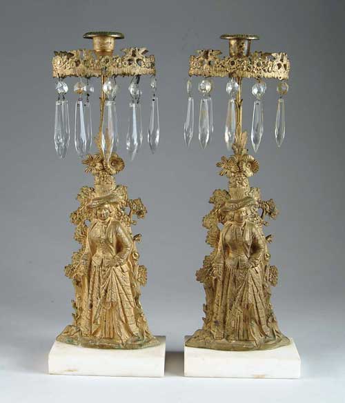 Appraisal: PAIR OF GIRANDOLE CANDLESTICKS Brass figures of woman with fancy