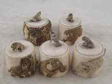 Appraisal: Five Chinese carved ivory boxes decorated with wild animals including