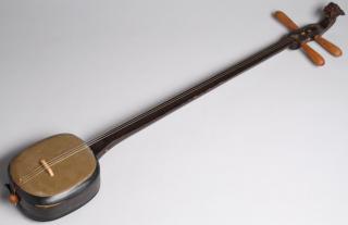 Appraisal: Chinese Sanxian Lute with Snakeskin Body The head molded from