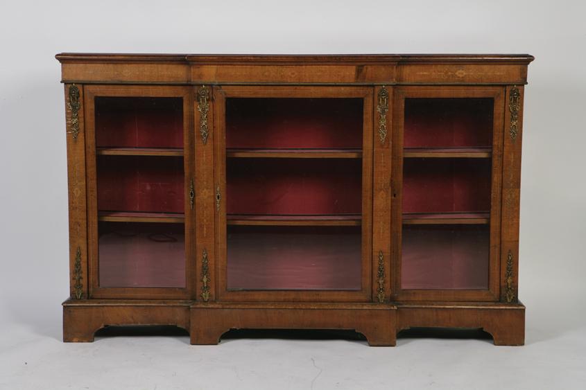 Appraisal: A VICTORIAN WALNUT AND GILT MOUNTED CREDENZA the rectangular breakfront