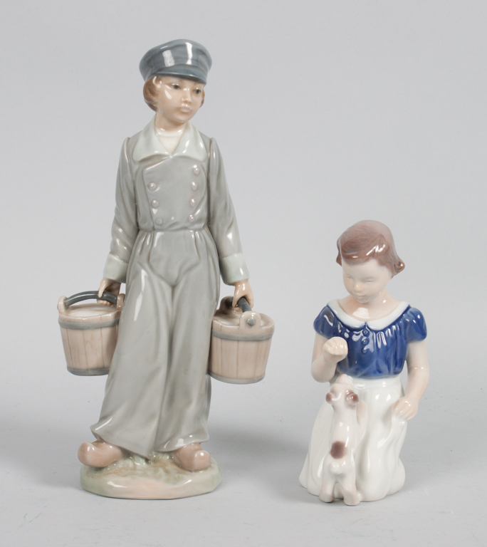 Appraisal: Lladro and Bing Grondahl porcelain figures Lladro figure of Dutch