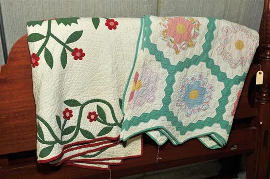 Appraisal: TWO QUILTS th century A profusely quilted white ground with