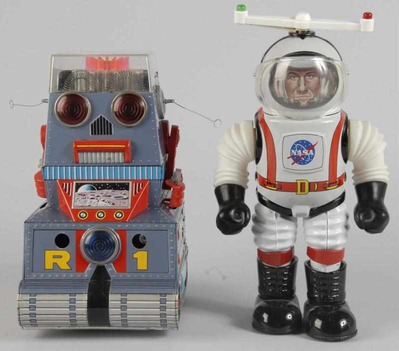 Appraisal: Lot of Tin Battery-Operated Space Toys Description Japanese Includes one