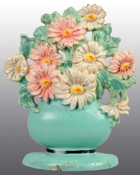 Appraisal: Cast Iron Daisy Bowl Doorstop Description Made by Hubley cat