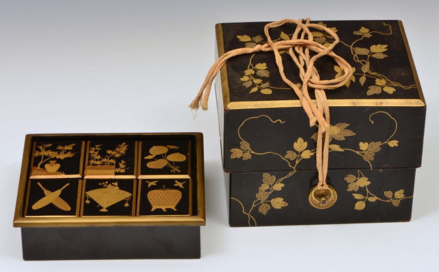 Appraisal: A JAPANESE LACQUER KOBAKO decorated flowers and foliage in gold