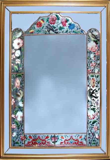 Appraisal: A RECTANGULAR HANGING WALL MIRROR with gilded frame inset fragments