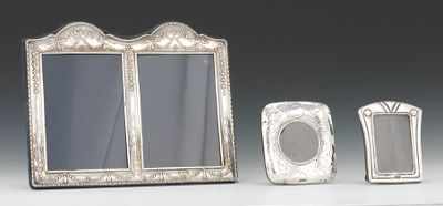 Appraisal: Three Repousse Silver Picture Frames The larger frame is made