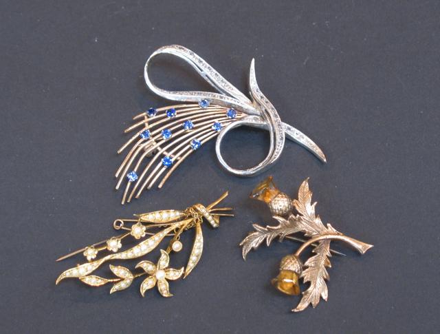 Appraisal: A MODERN BROOCH in the form of a stylised spray