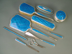 Appraisal: A German silver cased vanity set by Ellis Bros decorated