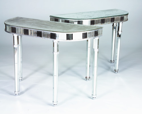 Appraisal: JANSEN Attr Fine pair of demi-lune console tables in silver-leaf-covered