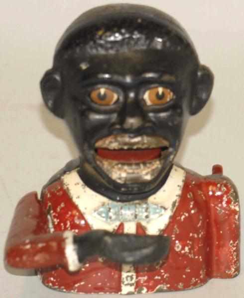 Appraisal: Cast Iron Jolly Mechanical Bank Has bow tie and red