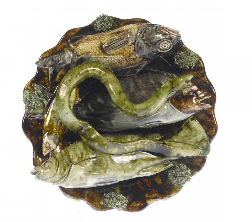 Appraisal: A PORTUGUESE PALISSY WARE TROMPE L'OEIL PLAQUE of four fish