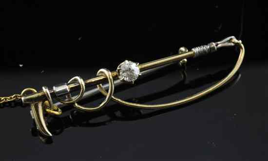 Appraisal: An Edwardian diamond set riding crop bar brooch in in