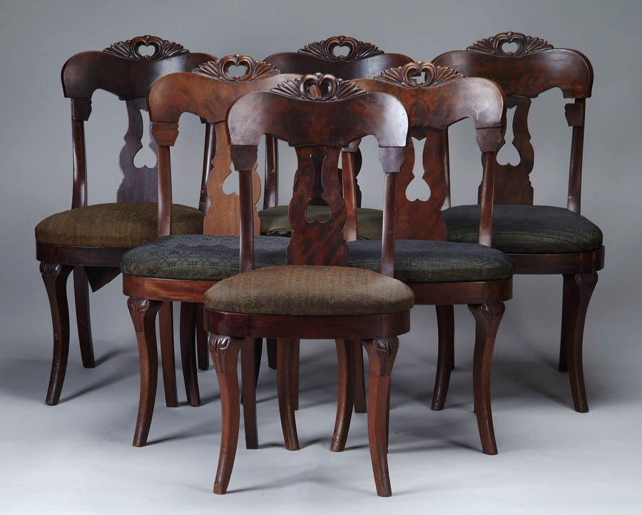 Appraisal: SET OF SIX MAHOGANY CARVED SABER LEG CHAIRS The nicely