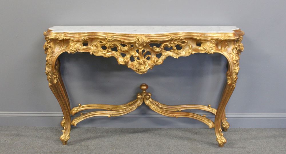 Appraisal: Pair Of Louis XV Style Giltwood Rococo Carved Marbletop Consoles