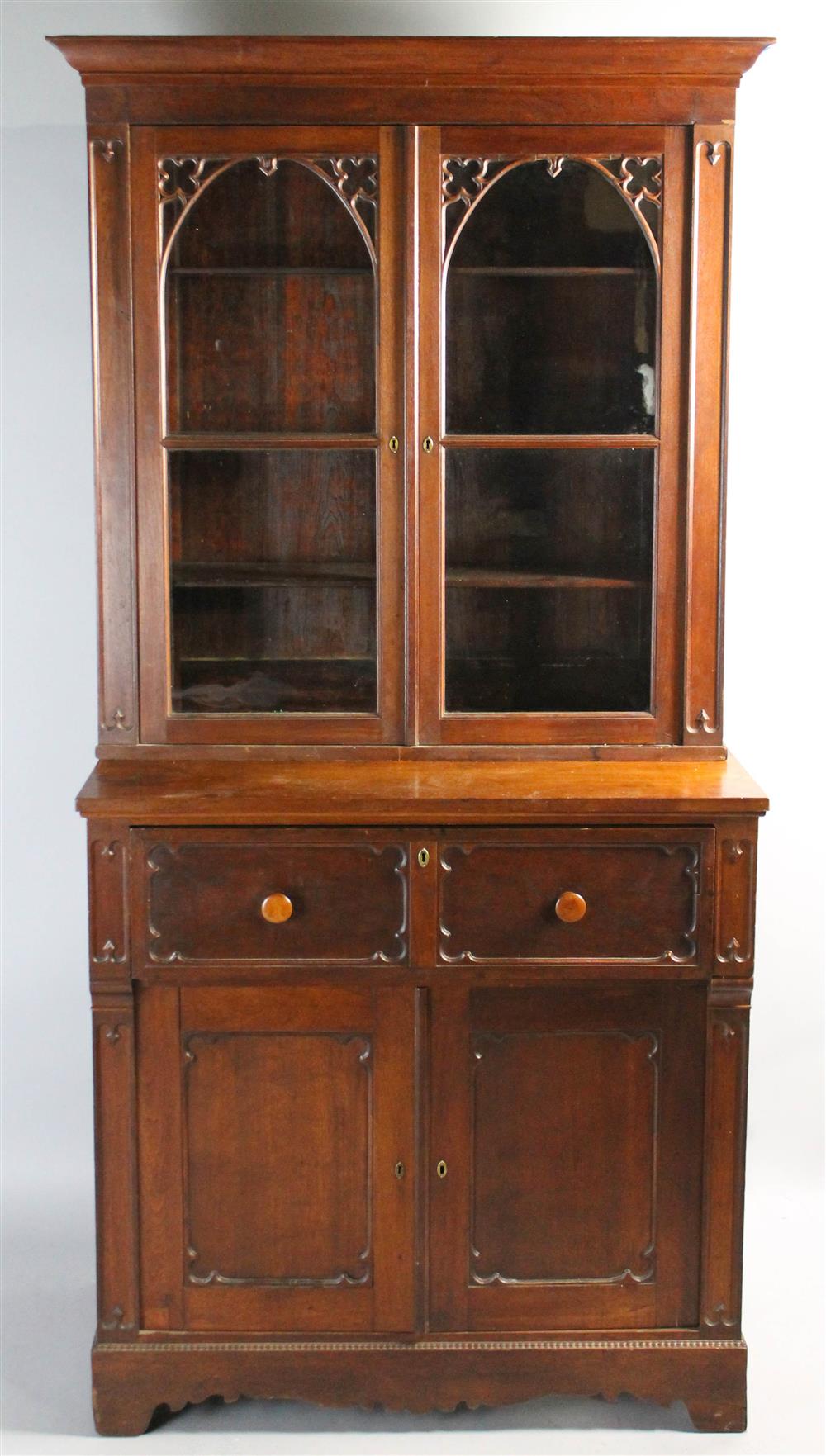 Appraisal: VICTORIAN WALNUT GOTHIC STYLE SECRETAIRE in two parts the upper