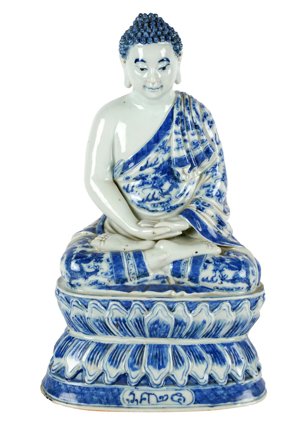 Appraisal: CHINESE BLUE WHITE PORCELAIN BUDDHA FIGUREunmarked Condition missing topknot from