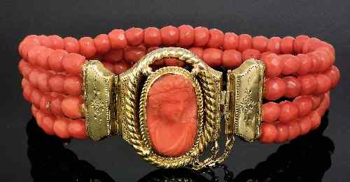 Appraisal: A late Victorian four strand red coral faceted bead bracelet