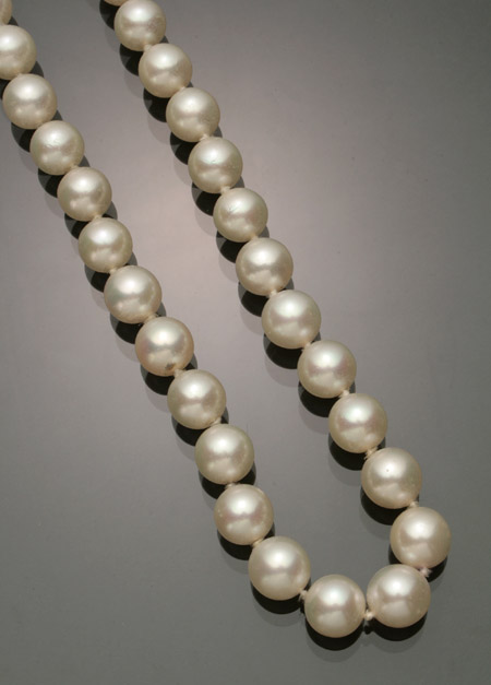 Appraisal: Matinee Length Cultured Pearl Necklace Knotted The single strand having