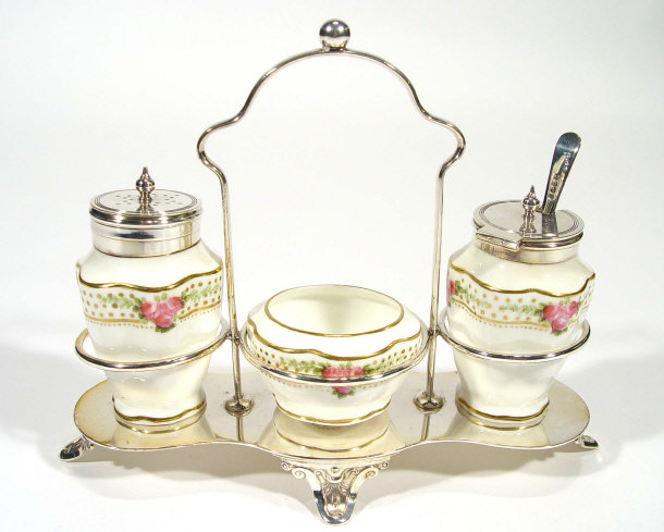 Appraisal: George Jones three piece china cruet set hand coloured and