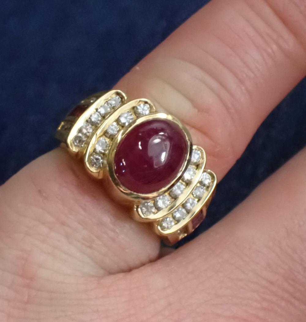 Appraisal: RUBY DIAMOND AND EIGHTEEN KARAT GOLD RING set with four