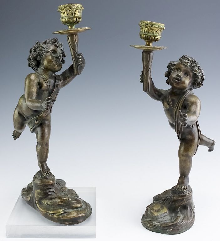 Appraisal: Pair Fine Antique Bronze Putti Cherub Candlesticks Pair of bronze