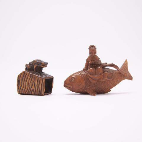 Appraisal: Two Carved Wood Netsuke Meiji Period Finely rendered one depicting