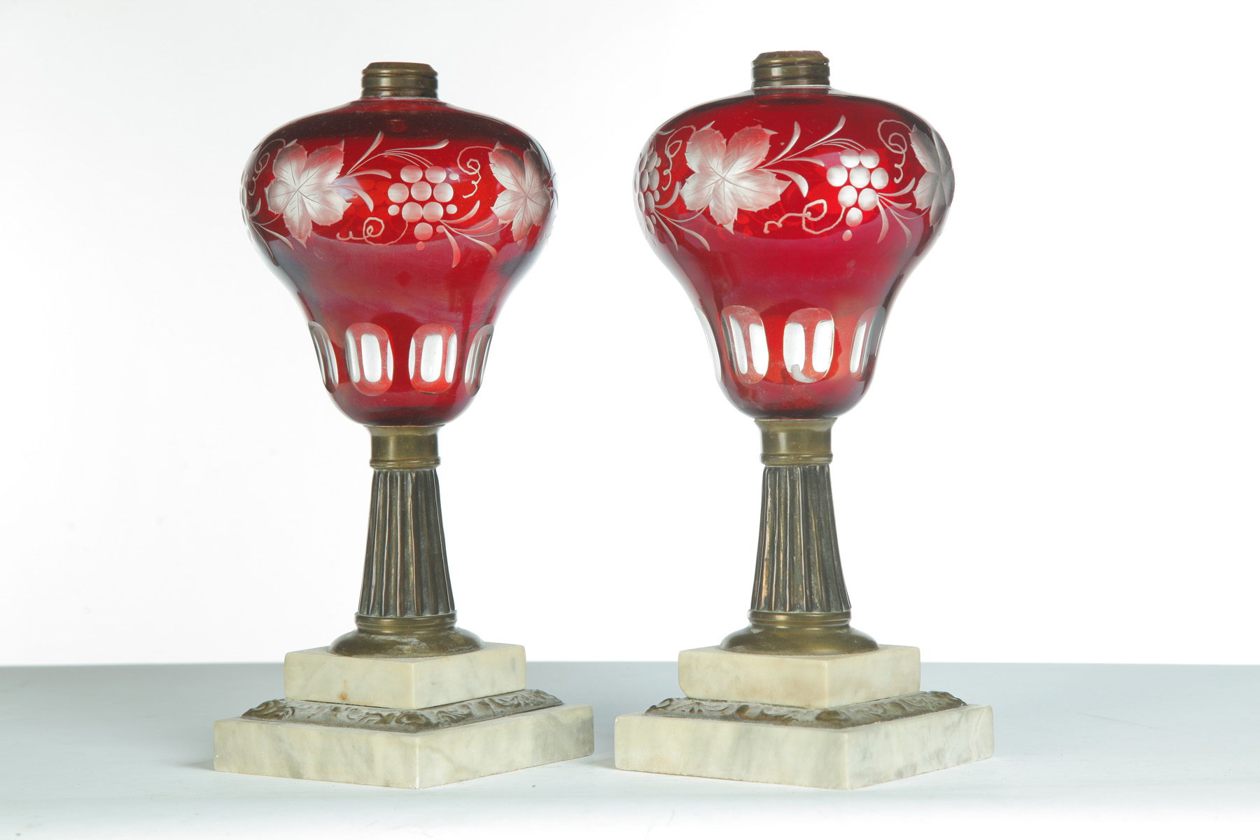 Appraisal: PAIR OF CUT OVERLAY OIL LAMPS American nd quarter- th