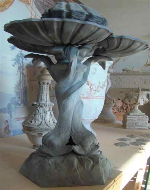 Appraisal: CAST IRON DOLPHIN AND SHELL FOUNTAIN early th century surmounted